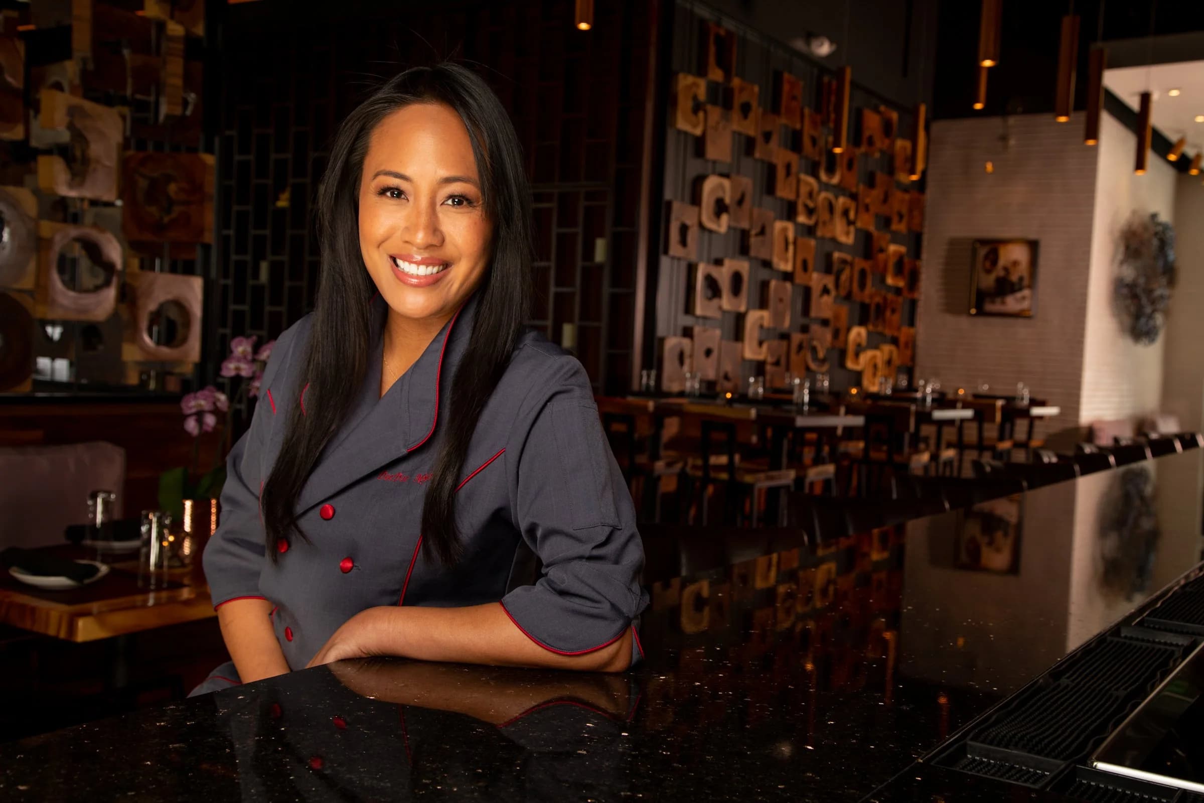 Chef DeeDee Niyomkul in the Nan Thai Buckhead dining room